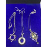 THREE SILVER NECKLACES WITH PENDANTS