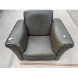 A CHILD'S MINIATURE FAUX LEATHER ARMCHAIR