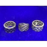 THREE HEAVY SILVER RINGS