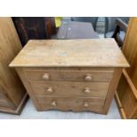 A VICTORIAN PINE CHEST OF THREE GRADUATED DRAWERS, 36" WIDE