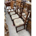 A SET OF SIX JACOBEAN STYLE DINING CHAIRS (TWO CARVERS)