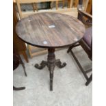 A VICTORIAN TRIPOD TABLE WITH ROSEWOOD TOP, 18" DIAMETER