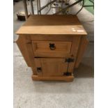 A WOODEN SIDE TABLE/CABINET WITH MAGAZINE RACK