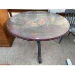 A LARGE PINE TRIPOD TABLE 52 INCHES DIAMETER WITH ONE CHAIR