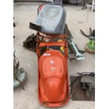 AN ELECTRIC FLYMO LAWN MOWER