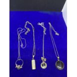 FOUR SILVER NECKLACES WITH PENDANTS TO INCLUDE A CLOCK, BLACKSTONE, RING ETC