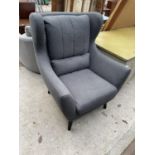 A MODERN GREY WINGED FIRESIDE CHAIR