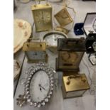 A COLLECTION OF VARIOUS CARRIAGE CLOCKS TO INCLUDE A MODERN DECORATIVE WALL CLOCK WITH PENDULUM