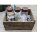 A VINTAGE WOODEN BOX CONTAINING GLASS STORAGE JARS AND SCIENTIFIC BOTTLES