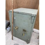 A LARGE HEAVY SAFE WITH INNER DRAWERS COMPLETE WITH KEYS