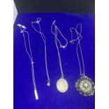 FOUR SILVER NECKLACES WITH PENDANTS TON INCLUDE A ST CHRISTOPHER, FLOWER, HEART AND PINK BAR