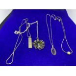 FOUR SILVER NECKLACES WITH PENDANTS ONE HALLMARKED BIRMINGHAM