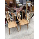 A PINE WHEELBACK DINING CHAIR, MATCHING CARVER AND A PINE DRESSING MIRROR