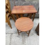 A RETRO TEAK NEST OF FIVE TABLES, FOUR BEING DROP-LEAF