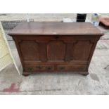 A GEORGE III OAK BLANKET CHEST WITH TWO DRAWERS TO THE BASE AND THEE PANEL FRONT, 50" WIDE