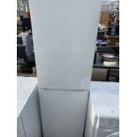 A WHITE BOSCH UPRIGHT FRIDGE FREEZER BELIEVED IN WORKING ORDER BUT NO WARRANTY