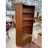 A RETRO TEAK G-PLAN CORNER UNIT ENCLOSING FOUR OPEN SHELVES AND CUPBOARD TO THE BASE, 43" WIDE