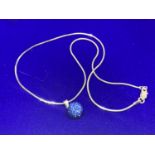 A SILVER CHAIN MARKED 925 WITH A BLUE CRYSTAL BALL PENDANT IN A PRESENTATION BOX