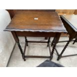 AN EARLY 20TH CENTURY OAK BARLEYTWIST OCCASIONAL TABLE