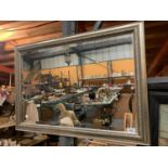 A GILT FRAMED RECTANGULAR BEVEL EDGED WALL MIRROR