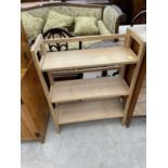 A FOLD AWAY THREE TIER BOOKCASE/DISPLAY SHELVES, 28" WIDE