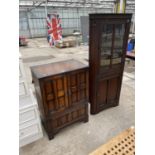 AN OAK PANELLED TV CABINET AND CORNER CUPBOARD