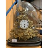AN ORNATE GILDED FRENCH MANTLE CLOCK WITH DOMED COVER - MAKER B B BREVETE, PARIS