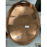 A LARGE OVAL VINTAGE COPPER TRAY - WIDTH 61CMS