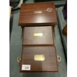 THREE WOODEN BOXES WITH BRASS NAME PLAQUES