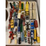 A LARGE QUANTITY OF DIE CAST VEHICLES TO INCLUDE A LONDON BUS, TRAILERS ETC