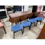 A G-PLAN E.GOMME DROP-LEAF DINING TABLE AND FOUR CHAIRS