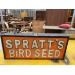 AN ILLUMINATED 'SPRATTS BIRD SEED' SIGN