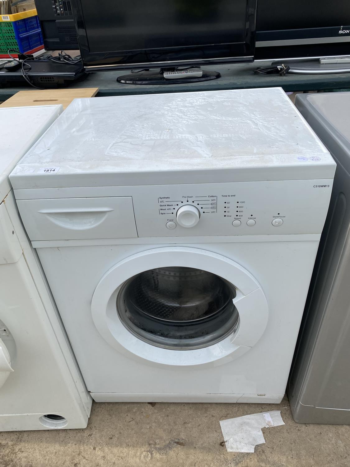 A WHITE CURRYS ESSENTIAL WASHING MACHINE BELIEVED IN WORKING ORDER BUT NO WARRANTY