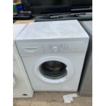 A WHITE CURRYS ESSENTIAL WASHING MACHINE BELIEVED IN WORKING ORDER BUT NO WARRANTY