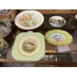 A GROUP OF FIVE FISH RELATED CERAMIC PLATES TO ALSO INCLUDE A MINTON GREEN COCKATRICE 4863 PLATE