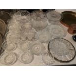 A LARGE COLLECTION OF CUT GLASS ITEMS TO INCLUDE GATEAU DISHES AND BOWLS ETC.