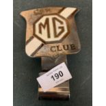 A 1950S M.G CAR BADGE