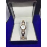 A PINK METAL LADIES WRIST WATCH BOXED AND NEW