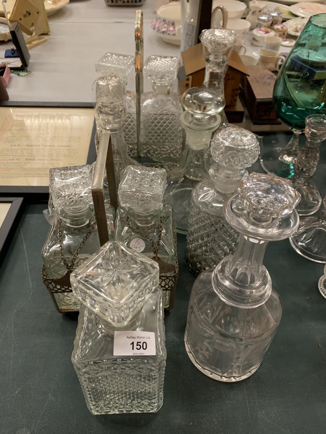 A LARGE COLLECTION OF VARIOUS GLASS DECANTERS TO INCLUDE TWO STANDS AND TWO SPIRIT LABELS