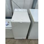 A WHITE HOTPOINT TOPLOADER WASHING MACHINE BELIEVED IN WORKING ORDER BUT NO WARRANTY