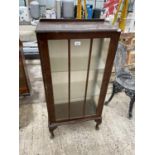 A MAHOGANY DISPLAY CABINET