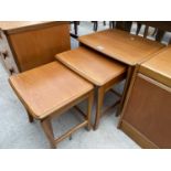 A RETRO TEAK NEST OF THREE TABLES