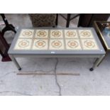 A RETRO TILE TOPPED COFFEE TABLE