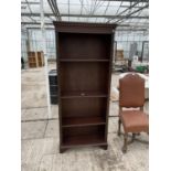 AN OPEN FOUR TIER MAHOGANY BOOKCASE