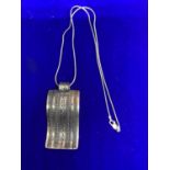 A SILVER CHAIN AND LARGE ABSTARCT SYTLE PENDANT MARKED 925 WITH A PRESENTATION BOX