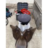 A HORSE SADDLE AND VARIOUS HORSE TACK