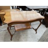 AN EDWARDIAN MAHOGANY TWO TIER OCCASIONAL TABLE