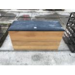 A PAIR OF STACKABLE WOODEN STORAGE BOXES WITH SEAT ON TOP