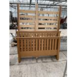 A MODERN OAK 4' 8" BEDSTEAD