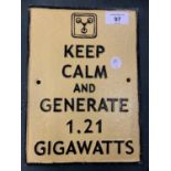 A CAST METAL "KEEP CALM AND GENERATE 1.2.1 GIGAWATTS" SIGN